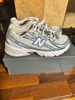 New Balance Kids White and Light Blue Athletic Sneakers